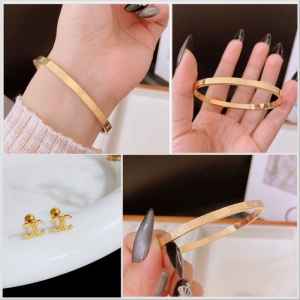 TT10439 - Set titan CELINE (vòng tay, bông tai - màu vàng)