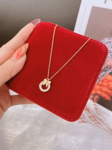TTN10482 - Dây chuyền titan nơ đính đá (màu vàng)