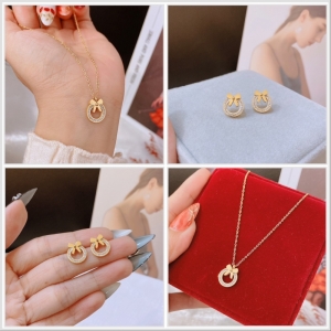 TT10487 - Set titan nơ viền đá (dây chuyền, bông tai - màu vàng)