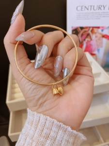 TTC10685 - Vòng tay titan nụ búp sen không khóa (size 55mm - màu vàng)