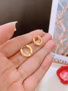 TTN10756 - Khoen tròn titan CELINE phối đá (màu vàng)