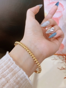 TTC10832 - Vòng tay titan bi (màu vàng)