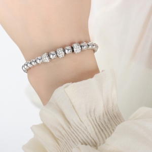TTN10859 - Lắc tay titan dây rút phối charm (màu trắng)