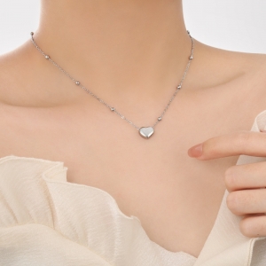 TTC10949 - Dây chuyền titan phối bi mặt tim phồng (màu trắng)