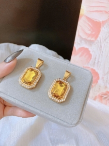 TTN11022 - Mặt dây chuyền titan đá màu trà (màu vàng)