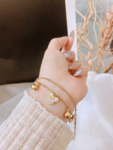 TTN11054 - Lắc tay titan mickey phối chuông dây đôi (màu vàng)