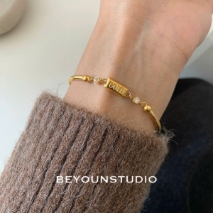 TTN11254 - Lắc tay titan thỏi vàng GOLD