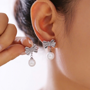 TTN11354 - Bông tai titan nơ ngọc trai rơi (màu trắng)