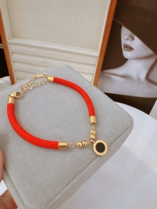 TTC11491-Lắc tay titan chỉ đỏ la mã