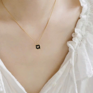 TTC11698-Dây chuyền titan bi nhí mặt tim đen