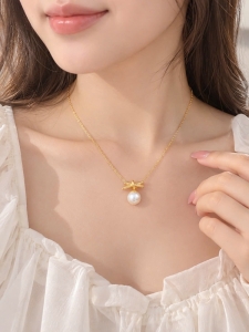 Dây chuyền titan thắt nơ ngọc trai